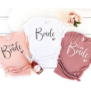 花嫁チームブライダルシャツ、ブライダルパーティーギフト、結婚式当日の準備、流行の独身パーティーグッズ、グループマッチングTシャツ、チームブライダルシャツ