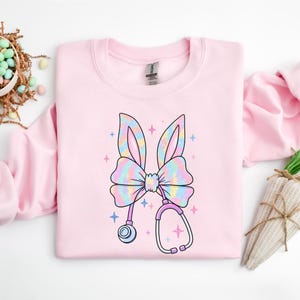 Easter Nurse Coquette Bow Shirt, Easter Nurse Shirt, Easter Day Gift for Nurse, Easter Stethoscope Shirt, Bunny Ear Easter Tee, Easter RN