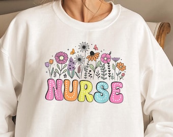 Buntes Krankenschwester Sweatshirt, Retro Krankenschwester Shirt, Krankenschwester Geschenk, RN Shirt, Vintage Krankenschwester Sweatshirt, niedlicher Krankenschwester Hoodie, Floral Krankenschwester Rundhalsausschnitt
