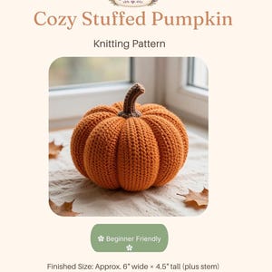 May include: A knitted orange pumpkin with a brown stem, featured in a pattern titled Cozy Stuffed Pumpkin by Tuesday Treasures. The text indicates a finished size of approximately 6 inches wide by 4.5 inches tall, plus the stem, for this beginner friendly project.