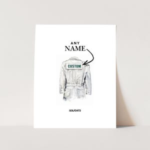 May include: A watercolor illustration of a white jumpsuit with the word "CUSTOM" on a green label. The text "ANY NAME" is above the jumpsuit, with a black arrow pointing to the label. The code "GOLF2472" is at the bottom.