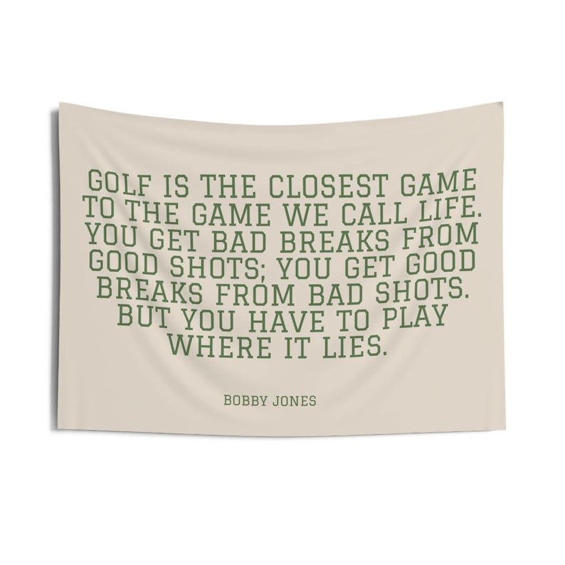 a quote in green text that says, "Golf is the closest game to the game we call life. You get bad breaks from good shots; you get good breaks from bad shots. But you have to play where it lies." - Bobby Jones