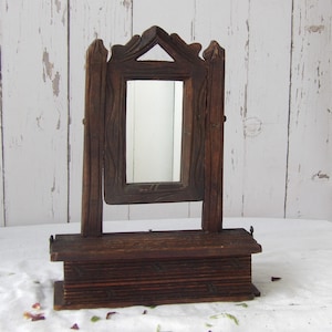 May include: A set of three ceramic mugs with a speckled, matte finish. The mugs are in shades of cream, light gray, and dark gray. Each mug has a simple, minimalist design, perfect for coffee or tea.