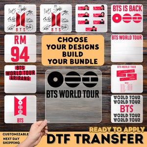 May include: A collection of DTF (Direct to Film) transfers featuring BTS-themed designs. The transfers include the BTS logo, signatures, and phrases like "BTS IS BACK" and "BTS WORLD TOUR." The transfers are ready to apply.