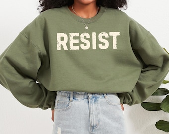 Moletom Resist: Fleece de algodão com estampa de ativista político