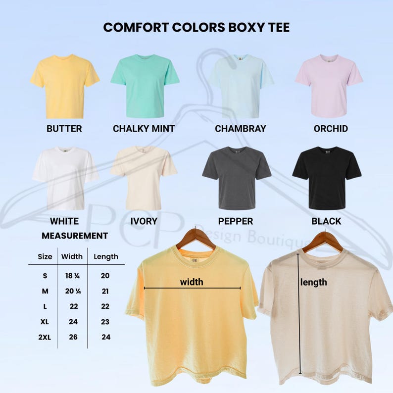 May include: A display of Comfort Colors Boxy Tees in various colors, including Butter, Chalky Mint, Chambray, and Orchid. The image also shows White, Ivory, Pepper, and Black tees. Measurements are provided for sizes S to 2XL, with widths ranging from 18 3/4 inches to 26 inches and lengths from 20 inches to 24 inches.