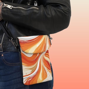 Cartera para teléfono móvil Energized Flow: bolso cruzado naranja y crema / Cartera artística de piel sintética / Accesorio ligero para viajes y uso diario