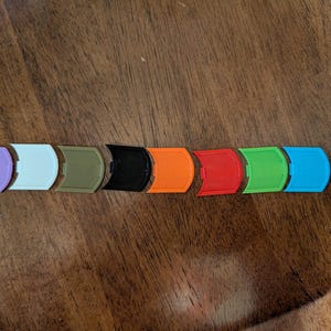 Various colored badges