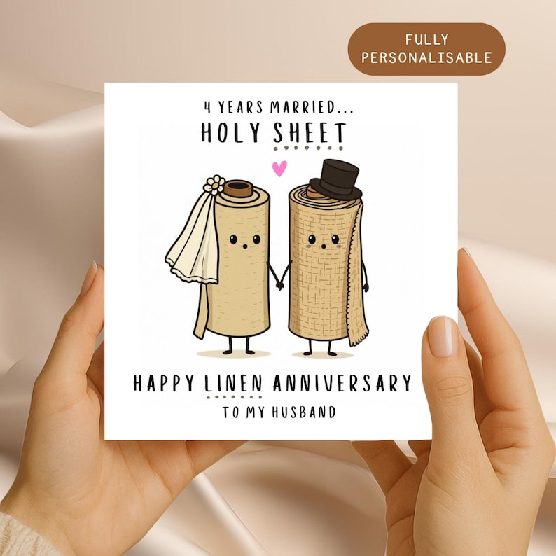 May include: A square greeting card featuring a cartoon illustration of two linen rolls holding hands. The left roll wears a white veil and the right roll wears a black top hat. Text reads: 4 YEARS MARRIED... HOLY SHEET, HAPPY LINEN ANNIVERSARY TO MY HUSBAND.