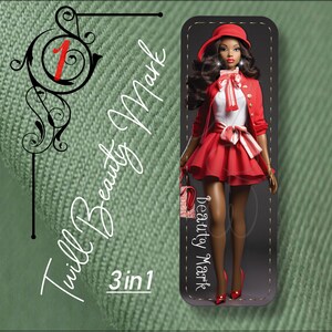 May include: A red and white doll with a red hat and a red and white dress. The doll is holding a red and white handbag. The doll is standing on a green background. The text "Twill Beauty Mark 3 in 1" is visible on the background.