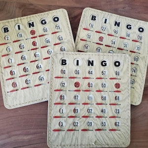 VINTAGE BINGOSPELkaarten uit de jaren 60, set van 3. Venster-/rolluiken, houtnerf, zwaar gestikt karton. Geweldige staat. 4 sets beschikbaar.