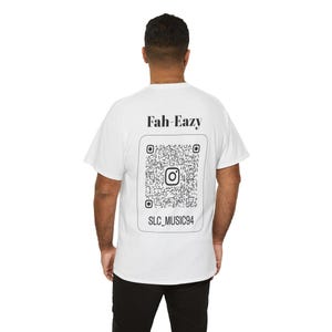 May include: White t-shirt with black text that reads "Fah-Eazy" and a black and white QR code with the text "SLC_MUSIC94" below it.