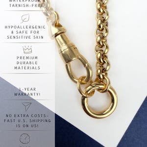 May include: A gold-toned rolo chain necklace featuring a lobster claw clasp and a circular pendant ring. The image includes text: WATERPROOF & TARNISH-FREE, HYPOALLERGENIC & SAFE FOR SENSITIVE SKIN, PREMIUM DURABLE MATERIALS, 1-YEAR WARRANTY!, FAST PROCESSING.