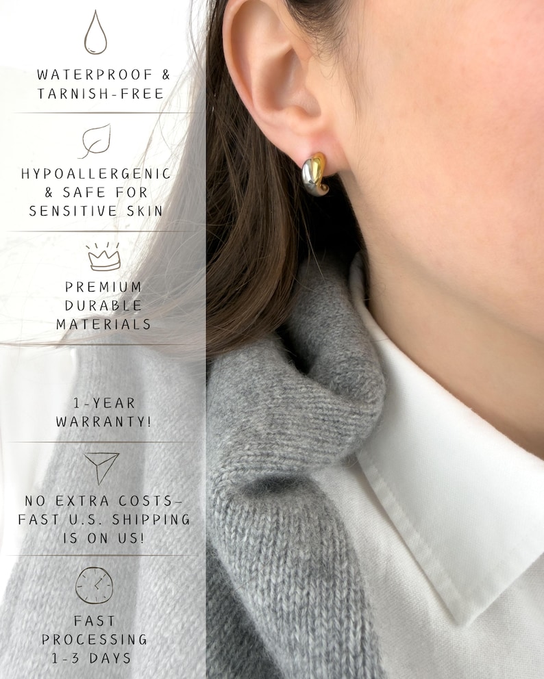 May include: A close-up of a gold and silver hoop earring on an ear. The earring is a small, curved design. Text on the left side of the image reads: Waterproof & Tarnish-Free, Hypoallergenic & Safe for Sensitive Skin, Premium Durable Materials.