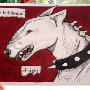 May include: A rectangular greeting card featuring a hand-drawn illustration of a white bull terrier with red eyes and a black spiked collar. The background is deep red. The text "The hellhound" and "charges" appears in white boxes.