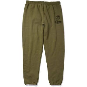 May include: Olive green sweatpants with an elastic waistband and cuffs. The right leg features a dark brown emblem and the letters "USMC". The pants are made of a soft, comfortable material.