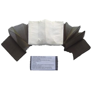 May include: A first aid field dressing, camouflaged, with dimensions of 4 x 6-1/4 to 7-1/4 inches. The dressing is unfolded, revealing a white central pad and brown-green camouflage fabric. A label provides instructions and details.