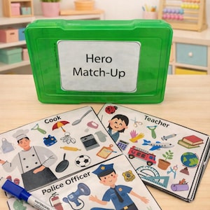 Juego de emparejamiento "Héroes en acción": Tarjetas didácticas sobre ayudantes de la comunidad, caja de actividades borrable.