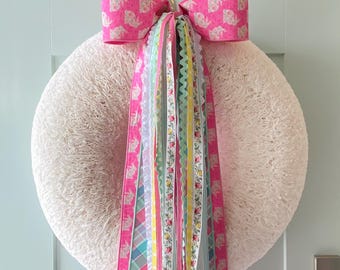 Juego de cintas de conejito de Pascua con lazo para corona con clip de metal adjunto.