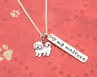 May include: Silver necklace with a small Maltese dog charm and a pendant that says "I love my Maltese".