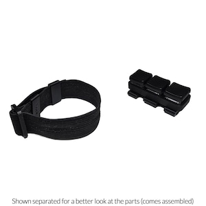 May include: Black elastic strap with a buckle and a separate black component with three square buttons. The items are shown against a white background. The text at the bottom says "Shown separated for a better look at the parts (comes assembled)".