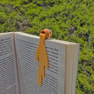 Marcapáginas de Winnie the Pooh: un adorable tarro de miel con dibujos animados para amantes de la lectura y lectores.