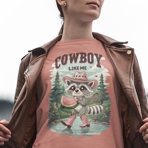 Cowboy Like Me Racoon Graphic Tee  Western Cowgirl Vintage Chic  T Shirt Trendy Merch for Fans