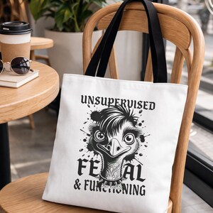 sarcastic quote tote bag on a chair with trendy edgy text design