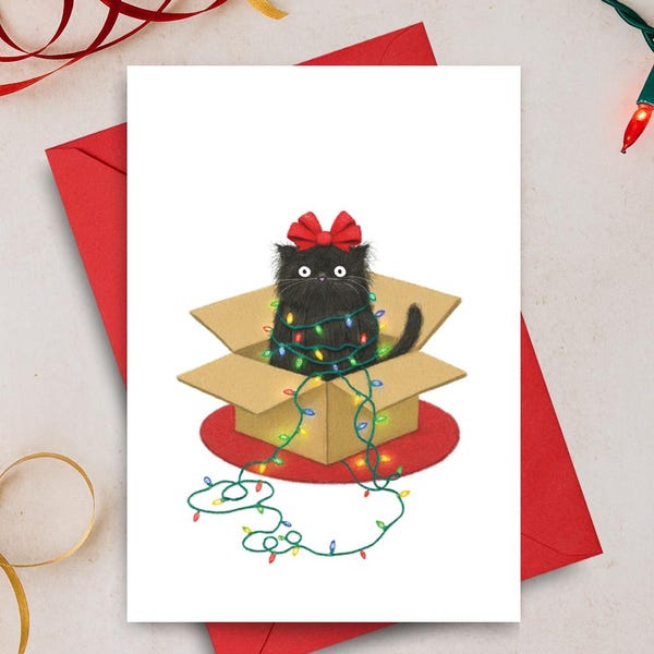 Tarjeta navideña divertida con un lindo gato negro, ideal para amantes de los gatos.