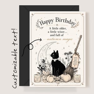 May include: A birthday card featuring a black cat, a crescent moon, a broomstick, pumpkins, and candles. The text reads: Happy Birthday, A little older, a little wiser... and full of autumn magic. A tag on the broom reads: another year of spells, sisters & second chances.