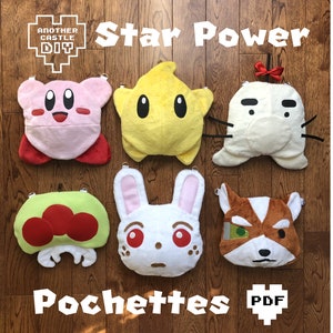 May include: Six plush character pouches with a pixelated heart and the text "PDF" on a wooden background. The pouches feature characters from the video game "Star Power" and the text "Star Power" and "Pouches" are displayed above the pouches.