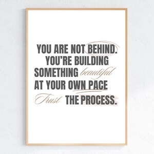May include: A motivational quote in black text on a white background: "You are not behind. You're building something beautiful at your own pace. Trust the process."
