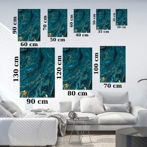 May include: A set of six abstract art prints featuring a blue and gold marbled design. The prints are available in various sizes, ranging from 20 cm x 30 cm to 90 cm x 130 cm.