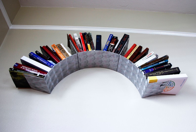 Sun Wall Bookshelf Engine Turned
