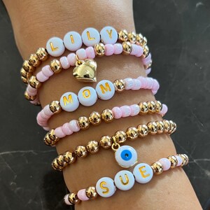 Personalized Name Beaded Bracelet: Pink Beads, Gold Accents, Custom Word