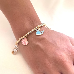 Ocean Charm Bracelet: Gold-Toned Beads, Enamel Starfish & Sea Life