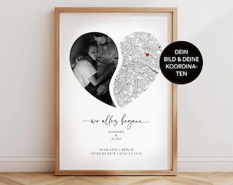 May include: A black and white photo of a couple in a heart-shaped frame. The couple is embracing, and the background is a map of a city. The text "wo alles begann" is written below the photo, along with the couple's names, the date, and the city and coordinates where they met.