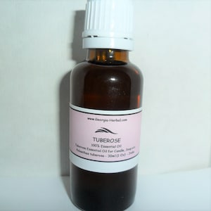 May include: A set of three ceramic mugs with a speckled, matte finish. The mugs are in shades of gray, white, and black. Each mug has a simple, modern design, suitable for coffee or tea. The mugs are stacked on top of each other.