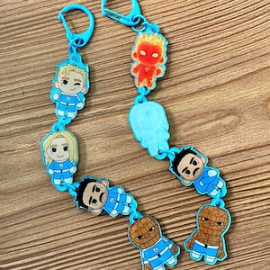 Double-sided design four connection keychain