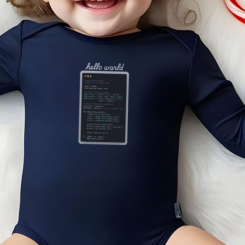 A baby wearing a blue onesie with a programming code printed on it, lying on a white surface.