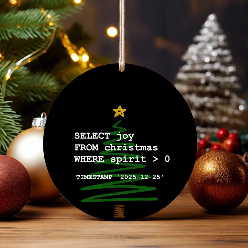 a Christmas ornament with a programming code on it, surrounded by Christmas decorations and ornaments.