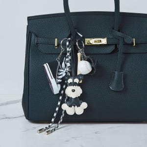Schwarz Chic Taschenanhänger für Geldbörse Kette trending 2024 Kettenanhänger für Geldbörse Rucksack Zubehör Leder Schnauzer Baseball Mini Sneaker
