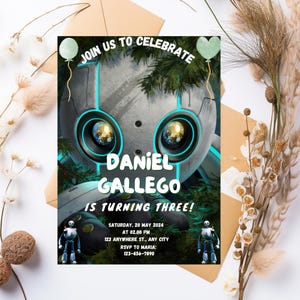May include: A birthday invitation featuring a robot with glowing blue eyes and the text "JOIN US TO CELEBRATE DANIEL GALLEGO IS TURNING THREE!"  The invitation includes the date, time, location, and RSVP information.