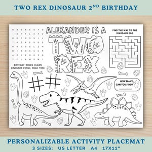 May include: A white and black personalized activity placemat with dinosaur illustrations and the text "TWO REX DINOSAUR 2ND BIRTHDAY". Includes a maze, word search, and counting activity. The placemat is available in 3 sizes: US Letter, A4, and 17x11 inches.