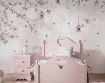 May include: A pink wooden bed with a heart-shaped cutout in the headboard. The bed is against a pink and white floral wallpaper with birds and butterflies. A pink nightstand with two drawers is next to the bed.
