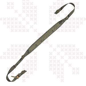 Peut inclure: Une sangle à motif camouflage Desert Night (DNC) avec des éléments métalliques. La sangle présente un motif de grille répétitif dans des tons de vert et de marron. Les mots "HYDRA" et "WTF" sont visibles en haut à gauche.