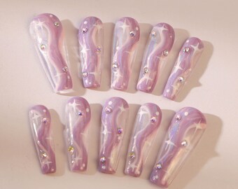 Ongles à presser longs amandes faits main : flocons d'étoiles, vernis gel