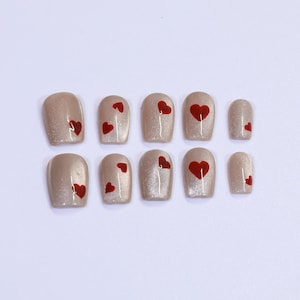 Uñas postizas de corazón hechas a mano: estilo almendra Y2K