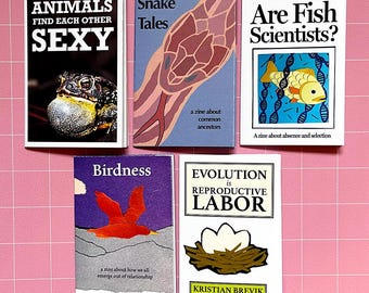 May include: A collection of small zines with colorful covers. Titles include "ANIMALS FIND EACH OTHER SEXY," "Snake Tales," "Are Fish Scientists?," "Birdness," and "EVOLUTION is REPRODUCTIVE LABOR." The zines feature illustrations and text.