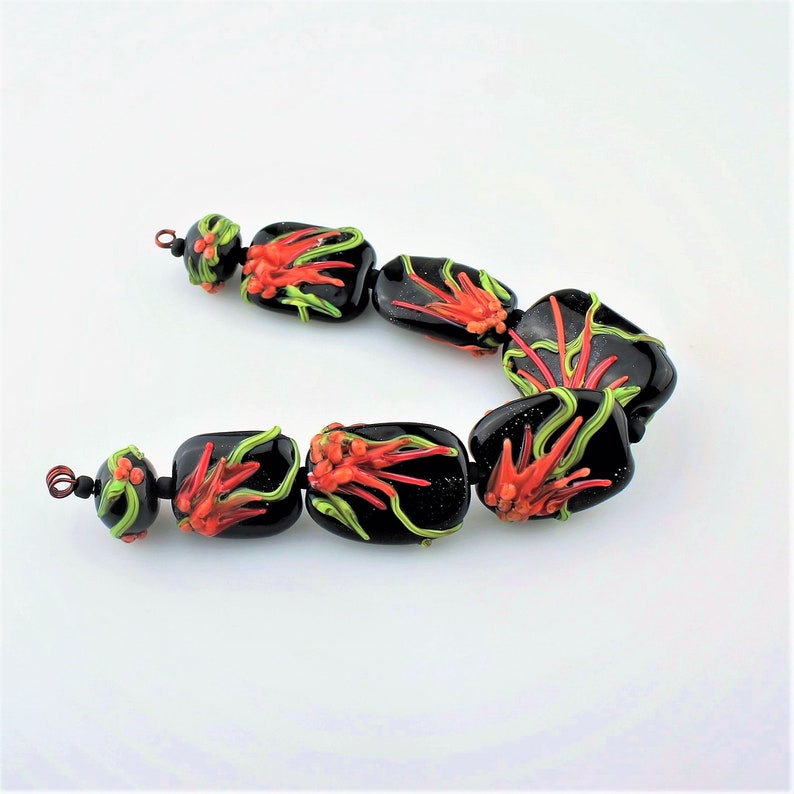 Orange Lampwork Glass Bead Set with Tropical Flowers Green Black Red Beads